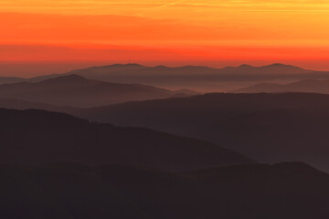 Red and orange sunset in the mountains