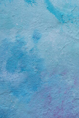 Abstract light blue color tone painted stucco wall texture background outdoors