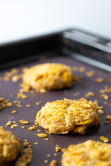 Cornflake Cookies on baking tray.