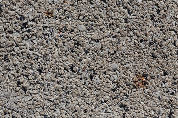 Crushed granite stones wall - close up