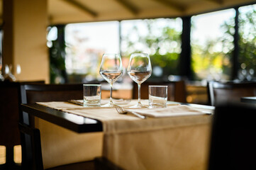 Elegant restaurant, table with empty glasses