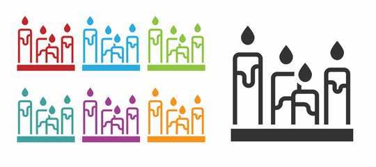 Black Burning candle icon isolated on white background. Cylindrical aromatic candle stick with burning flame. Happy Halloween party. Set icons colorful. Vector