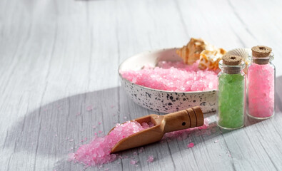 Cosmetic sea salt pink and green for spa treatments, selective focus