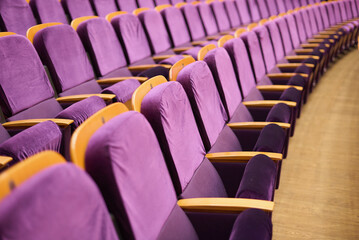 Obraz premium Upholstered chairs in an empty concert hall. Pandemic