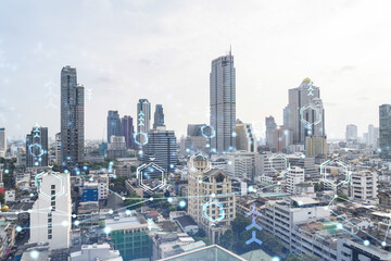 Naklejka na ściany i meble Technology hologram over panorama city view of Bangkok. The largest tech hub in Southeast Asia. The concept of developing coding and high-tech science. Double exposure.
