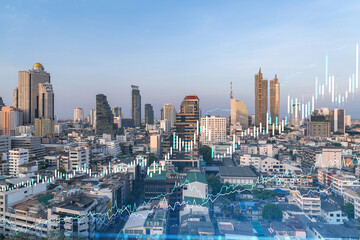 Fototapeta na wymiar Glowing FOREX graph hologram, aerial panoramic cityscape of Bangkok at sunset. Stock and bond trading in Southeast Asia. The concept of fund management. Double exposure.