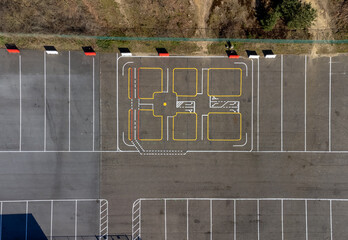 Parking at Zolder F1 racing trach parking seen from above with drone aerial top down view. Lines...