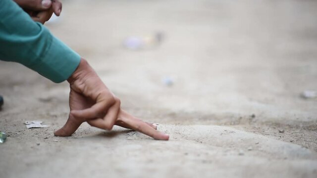children playing marble balls 