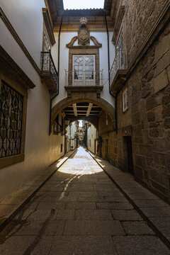 An alley between residential buildings