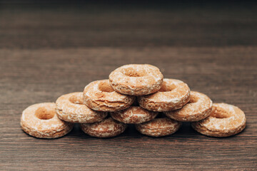 Beautiful Bagels and Gingerbreads Lie on a Brown Background