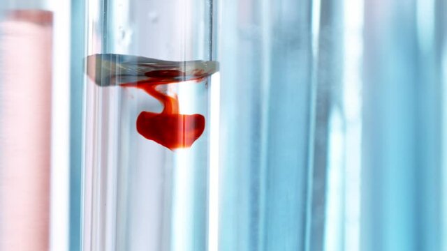 Super slow motion of drawing blood into syringe. Macro shot medical procedure. 1000 FPS.