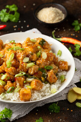 General Tso Tofu with rice, green onion and pak choi. Asian Vegan Food