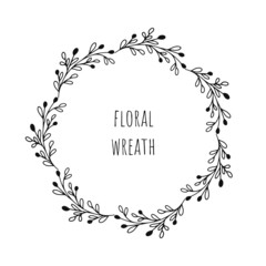 Floral hand drawn wreath with flowers, leaves. Vintage poster, circular frame with doodle flowers and herbs. For invitations, greeting cards, quotes, blogs, Wedding frames, posters. Vector isolated