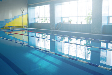 Interior of public swimming pool. empty pool before swimming lessons
