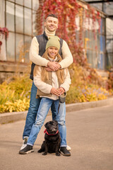 Obraz premium A family and their pet spending morning together