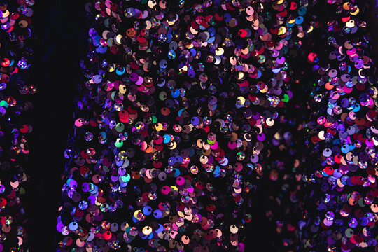 Close up on a material covered with small sequins