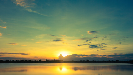 Naklejka na ściany i meble Beauty full sunset in the river. Amazing sunset form thailand