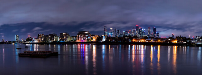 Aerial bird's eye view of famous Canary Wharf skyscraper complex, Isle of Dogs in London, United...