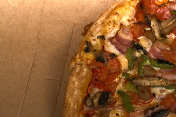 The edge of the pizza with a golden crust