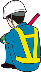 膝を抱える男性警備員