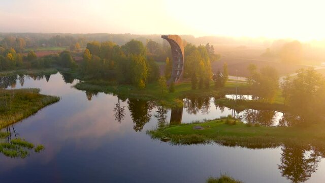 Aerial view of Kirkilai karst lakes and lookout tower in the sunny fall morning