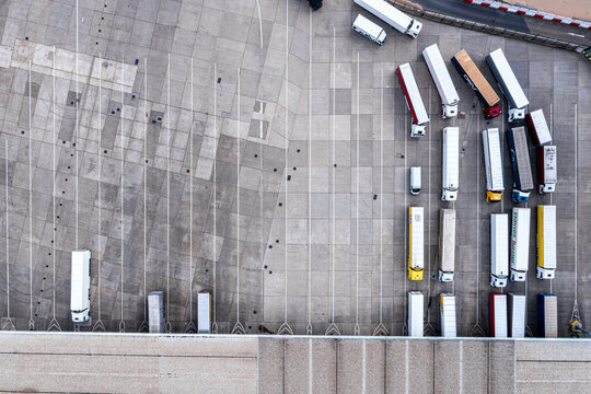 Aerial View Of Harbor And Trucks Parked Along Side Each Other Getting Ready For Embarking The Dover Ferry To Calais