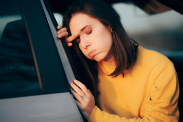 Woman Getting out of the Car Suffering from Motion Sickness  - obrazy, fototapety, plakaty