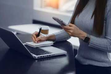 Businesswoman using digital smartphone, tablet computer, technology digital concept.