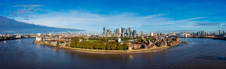 Fototapeta na wymiar Aerial panoramic view of the Canary Wharf business district in London, UK. Financial district in London.
