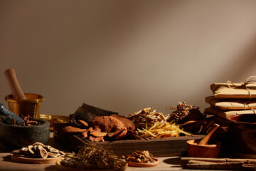 Traditional chinese medicine with herb and spices in light a grey background , for medicine...