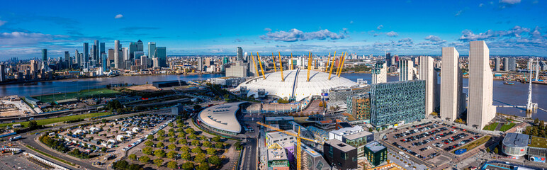 Aerial bird's eye view of the iconic O2 Arena near isle of Dogs and Emirates Air Line cable car in London, United Kingdom