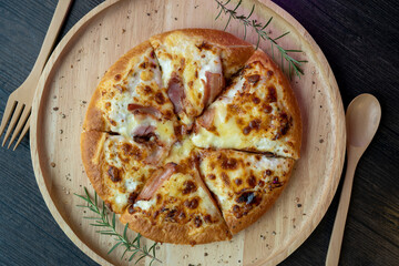 Delicious fresh pizza served on wooden plate, Hot Homemade Pizza Ready to serve.