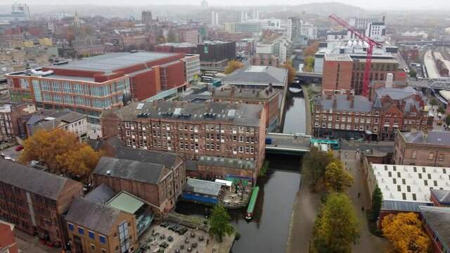 Nottingham canal  England and road bridges ,drone aerial footage vibrant autumn colours