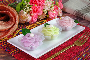 Chor Keaw Auspicious Thai dessert for wedding ceremony party and all Thai festival. Flower-shaped Thai sweetmeat, selective focus