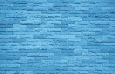 Brick wall painted with blue dark paint pastel calm tone texture background. 