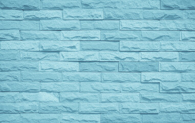 Brick wall painted with pale blue paint pastel calm tone texture background. 