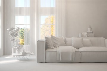 Stylish room in white color with sofa and autumn landscape in window. Scandinavian interior design. 3D illustration