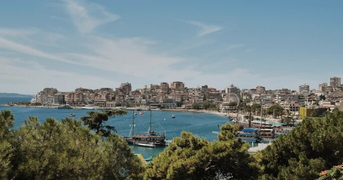 Fantastic spring cityscape of Saranda port. Captivating Ioninian seascape. Wonderful evening scene of Albania, Europe. Traveling concept background.