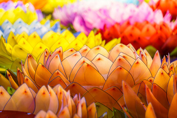 Beautiful kratongs Made of foam is floating on the water for Loy Krathong Festival or Thai New Year...