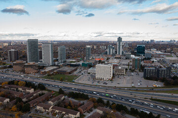 drone view of the don valley highway as well as condos  traffic hotels and houses