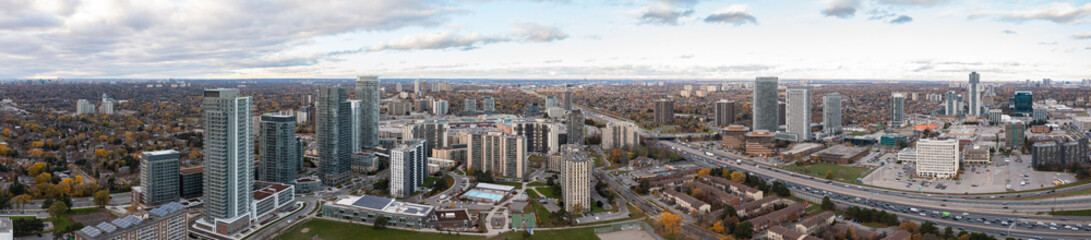 Panoramas drone view of the don valley highway as well as condos  traffic hotels and houses