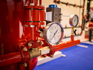Modern fire protection system. Fire protection system in red. Flame extinguishing apparatus at enterprise. Indoor flame detection and extinguishing. Fire prevention equipment. Pressure Sensors