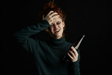 woman with bottle of alcohol bruises under eyes changes depression dark background