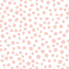 Fototapeta na wymiar Abstract spotted seamless pattern in pastel colors. Pink dotted background. Vector hand-drawn illustration. Perfect for print, decorations, wrapping paper, covers, invitations, cards.
