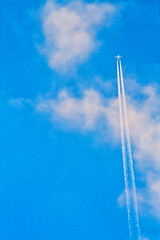 Plane Flying with Trails