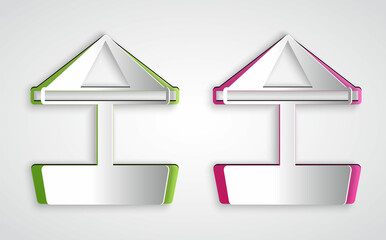 Paper cut Sandbox for kids with sand and umbrella icon isolated on grey background. Paper art style. Vector