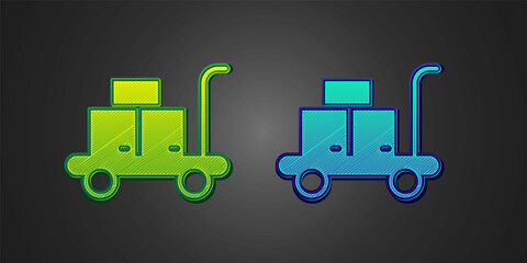 Green and blue Trolley suitcase icon isolated on black background. Traveling baggage sign. Travel luggage icon. Vector
