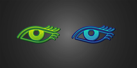 Green and blue Beautiful woman eye icon isolated on black background. Vector