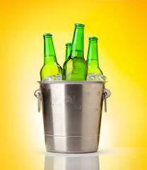 Beer bottles in ice bucket