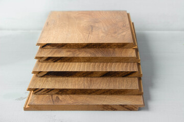 Closeup laminate and parquet wood chipboard, architecture and construction for flooring and interior design in market.